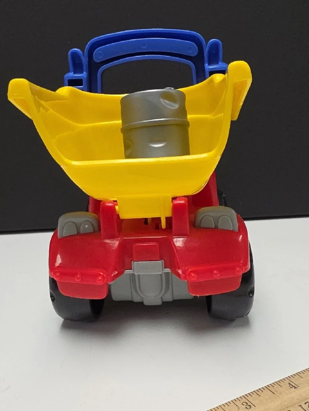 Fisher-Price Little People Red & Yellow Dump Truck with Figure And Accessory
